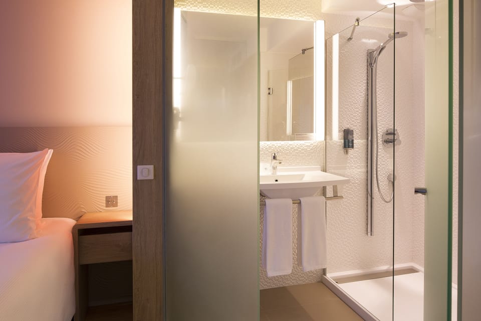 Standard Room Free WiFi & Pool Access | Down comforters, in-room safe, soundproofing, free WiFi