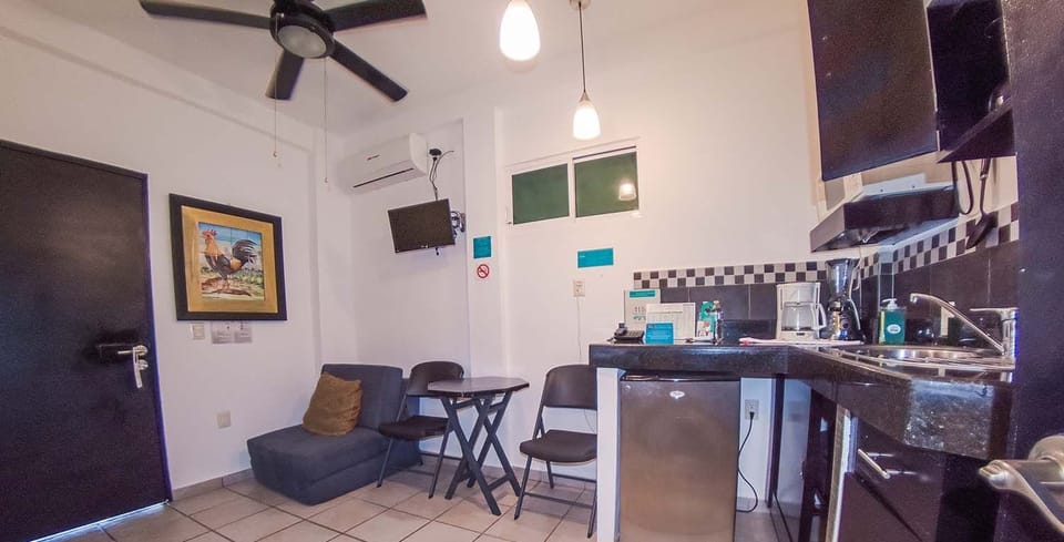Studio Room | Private kitchen | Fridge, microwave, coffee/tea maker, cookware/dishes/utensils