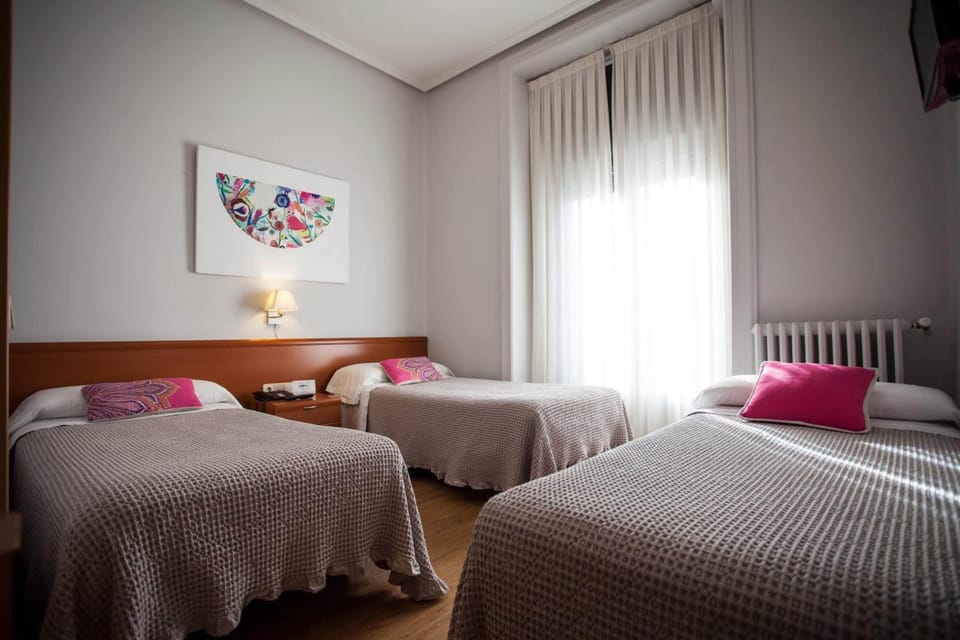 Desk, laptop workspace, free WiFi, bed sheets