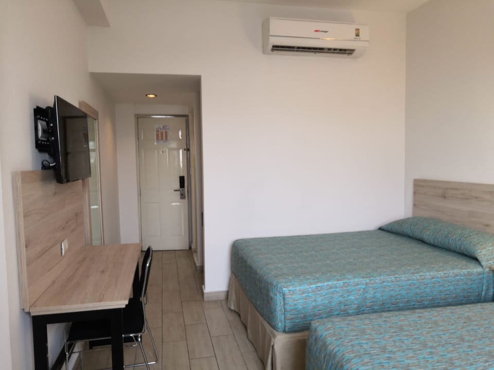 Standard Room, 2 Double Beds, Non Smoking | In-room safe, laptop workspace, WiFi (free), bed sheets