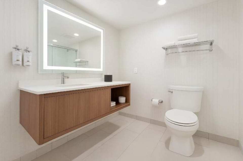 Combined shower/tub, hair dryer, towels, soap