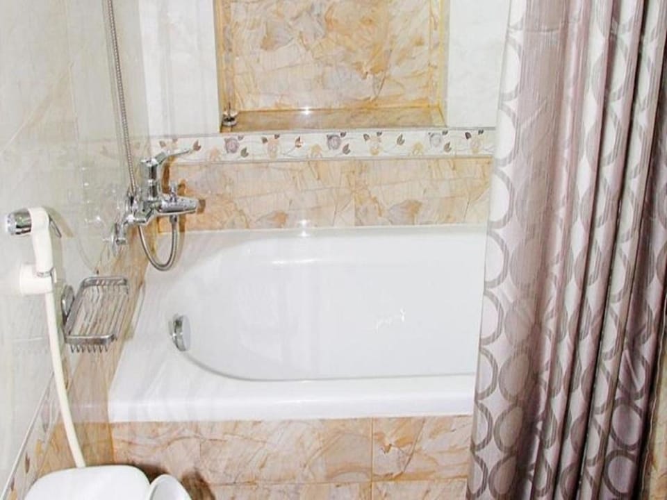 Deluxe Balcony | Bathroom | Shower, hair dryer, slippers, bidet