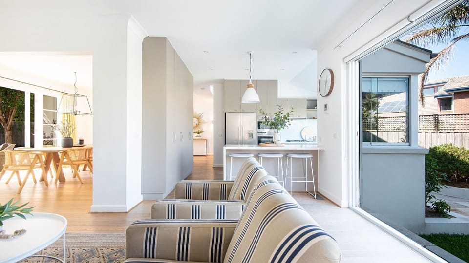 Living and kitchen leads straight onto the garden, pool and BBQ