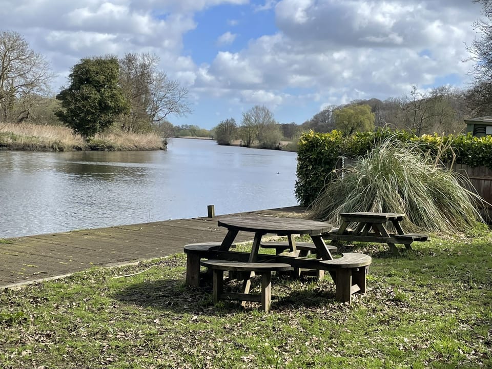 Private riverside barbeque area and mooring