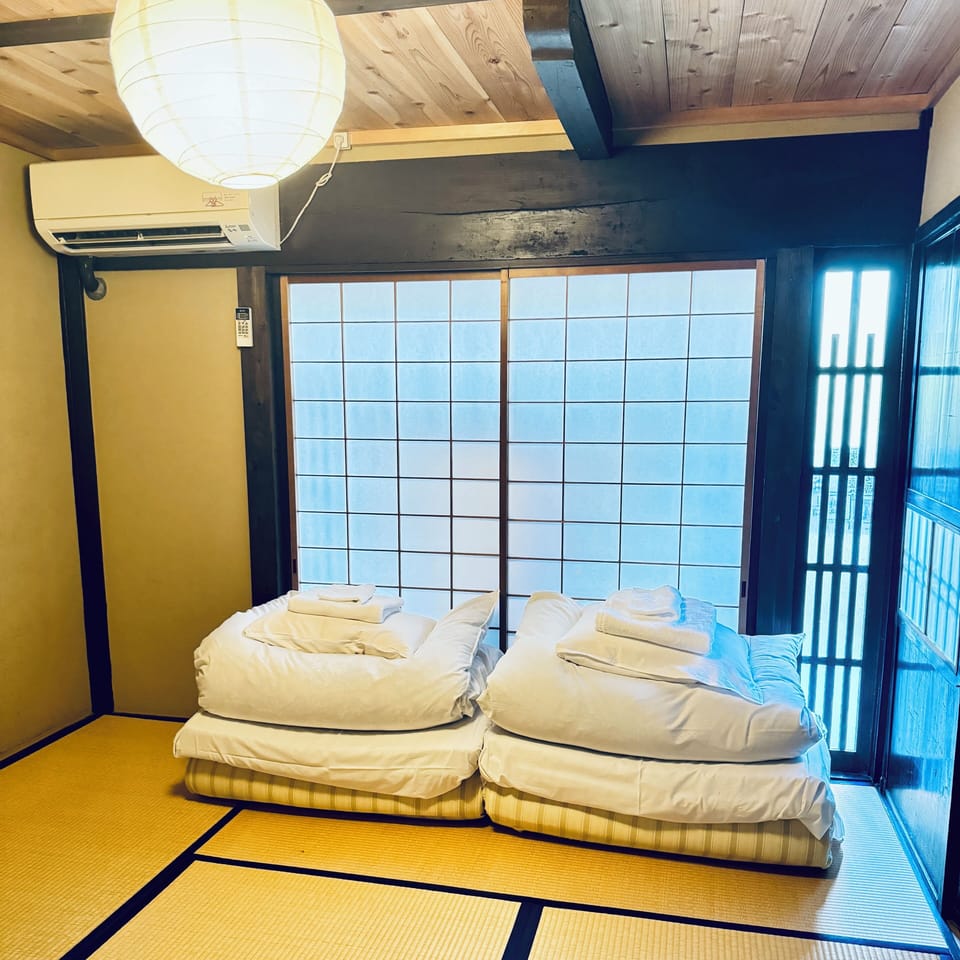 Economy Twin Room, Non Smoking, Shared Bathroom | Iron/ironing board, free WiFi