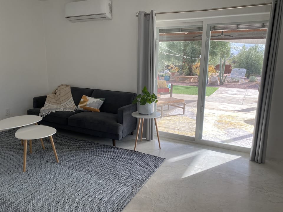 Opens onto a large south facing covered patio. 