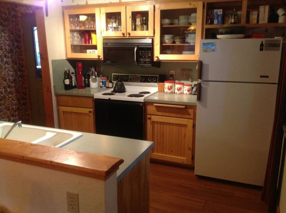 Pots, pans, utensils, silverware, glassware, spices provided. Coffeemaker, waffle iron, blender, toaster also.