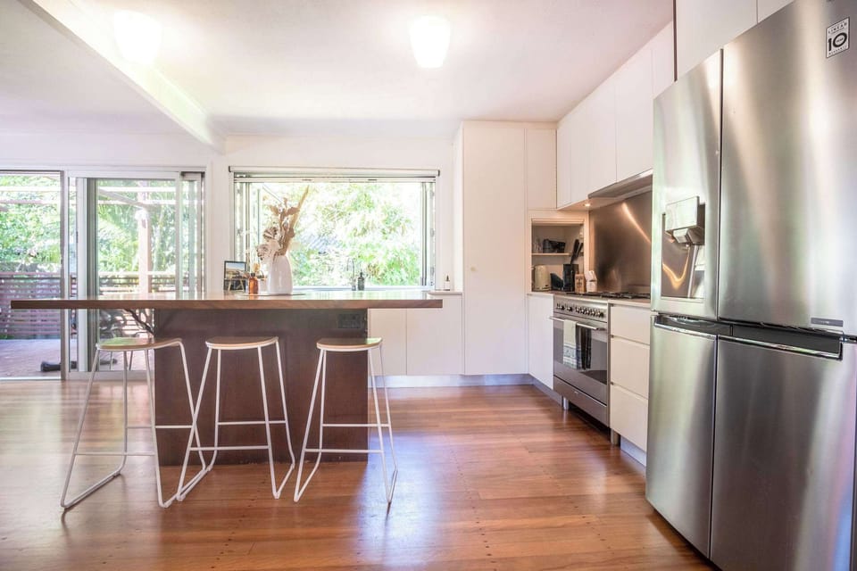 Open plan kitchen featuring modern appliances and a separate island.