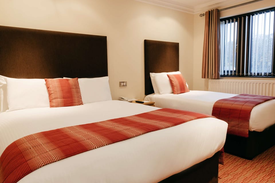 Family Room, Multiple Beds, Non Smoking | Desk, blackout drapes, iron/ironing board, free WiFi