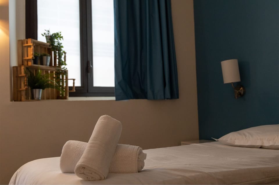 Superior Quadruple Room | Premium bedding, in-room safe, desk, blackout drapes
