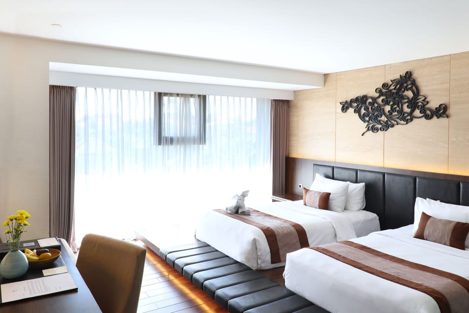 Deluxe Room | Select Comfort beds, minibar, in-room safe, desk