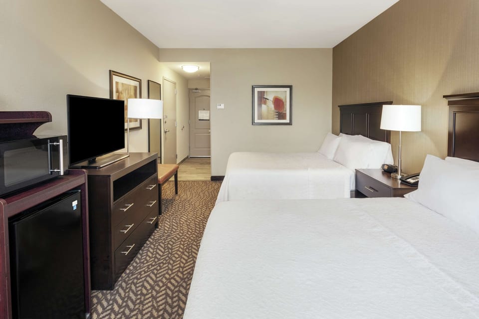 Room, 2 Queen Beds | Desk, blackout drapes, iron/ironing board, free WiFi