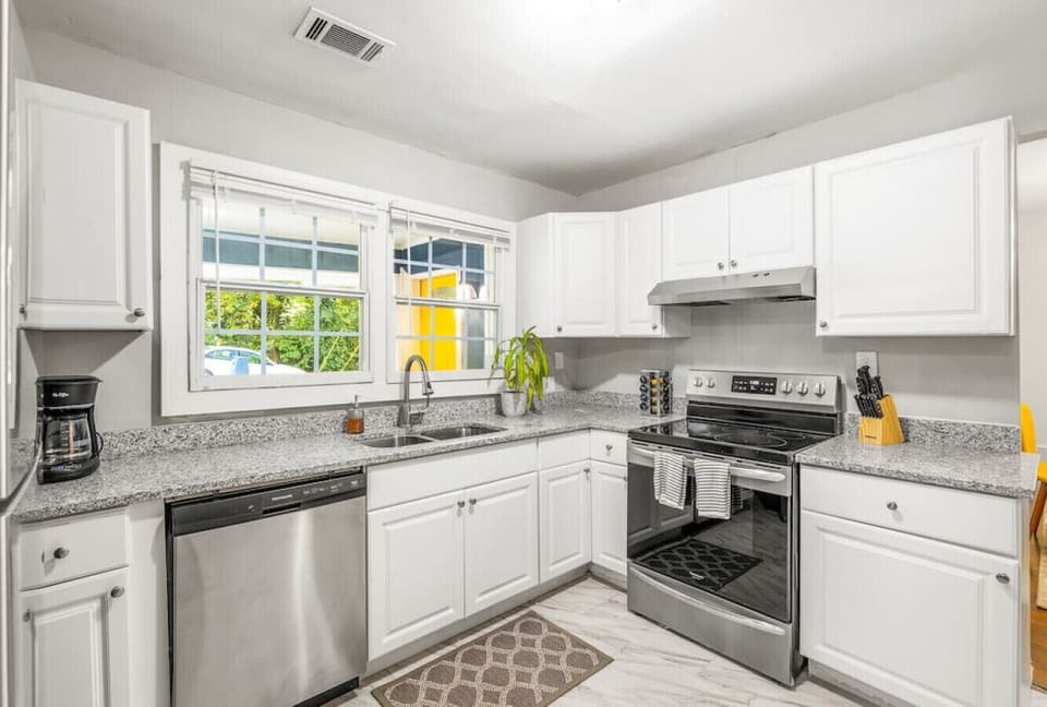 Kitchen elegance: Brand new stainless steel appliances for a sleek, modern cooking experience.
