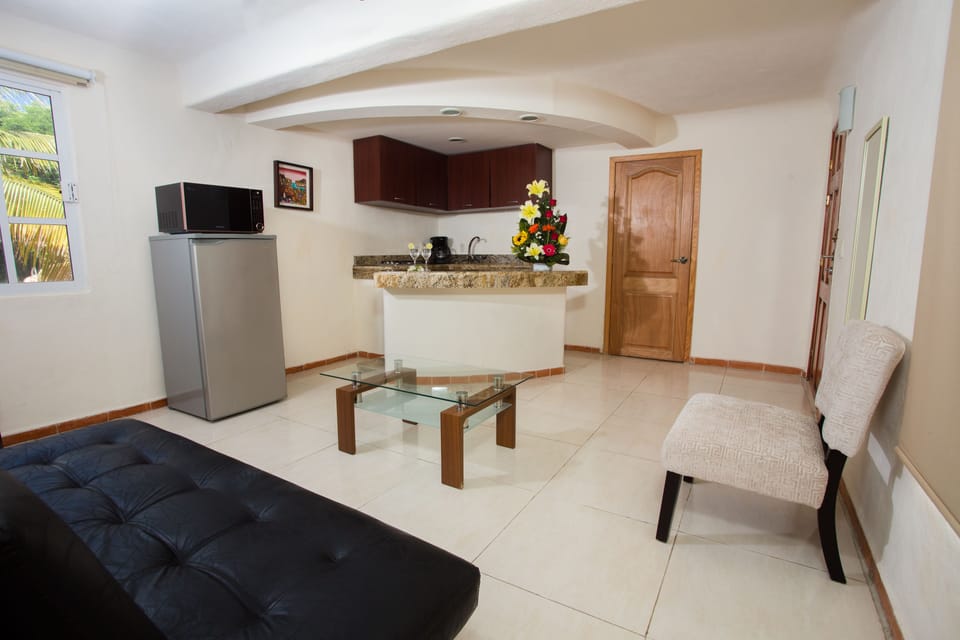 Junior Suite, 1 Bedroom, 1 living room, Kitchenette | In-room safe, desk, free WiFi, bed sheets