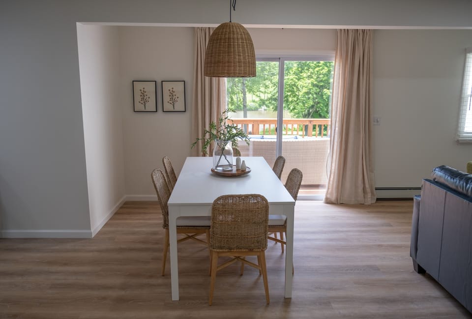 Your dining area adjacent to kitchen, great room and sliding door 