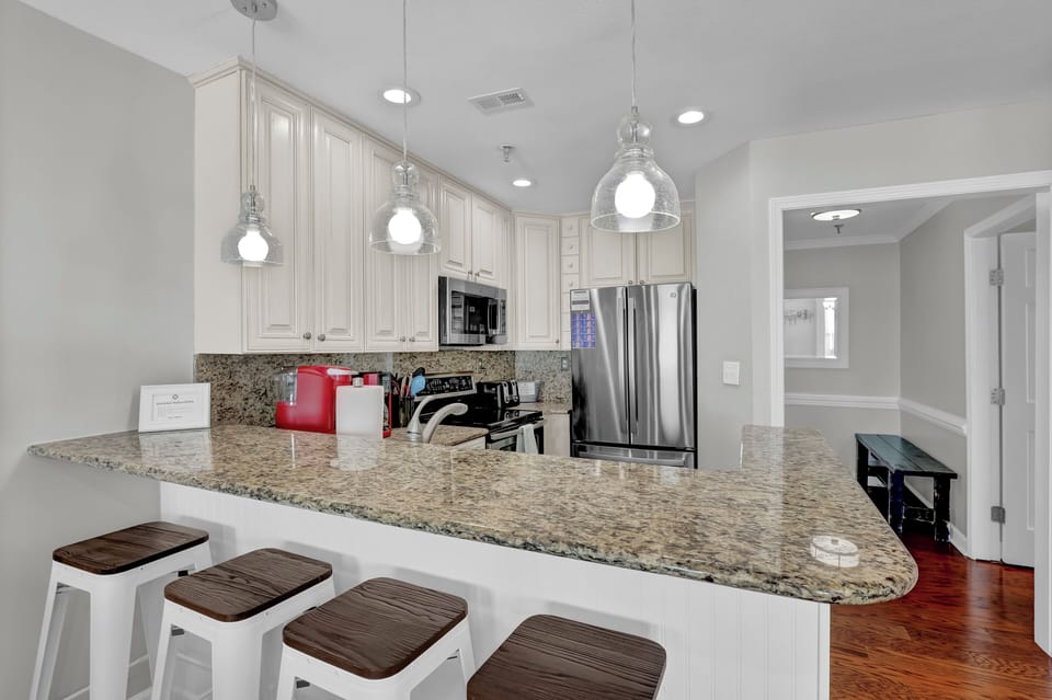 Well appointed kitchen with full size appliances.