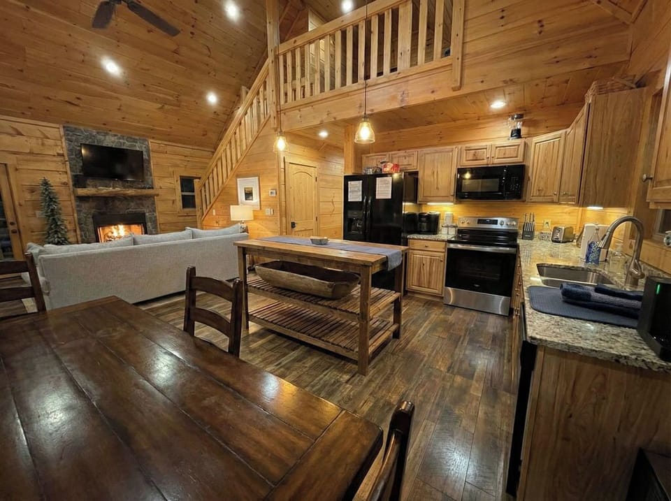 Living room, Kitchen and Dining table in an open-plan space.