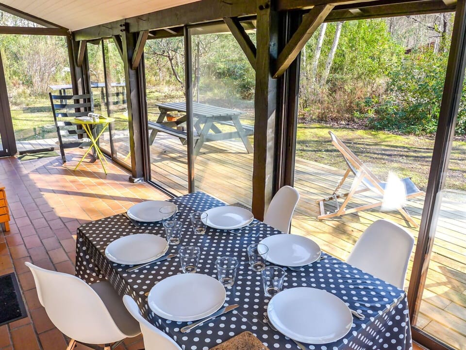 Table, Plant, Property, Furniture, Tableware, Chair, Dishware, Building, Outdoor Table, Wood