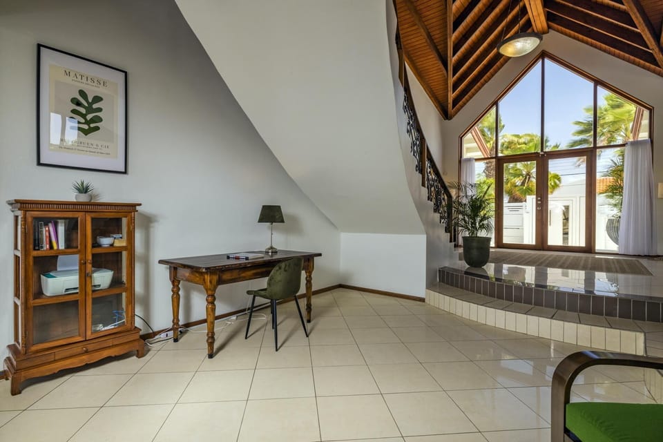 As you enter this property, you will be astounded with its floor-to-ceiling glass entrance door and wide and spacious entryway.