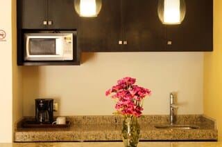 Suite with balcony | In-room safe, desk, free WiFi, bed sheets
