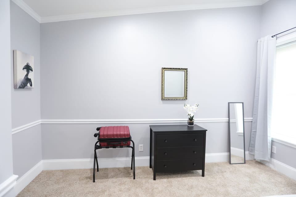 Dresser and luggage rack in each Master bedroom.  