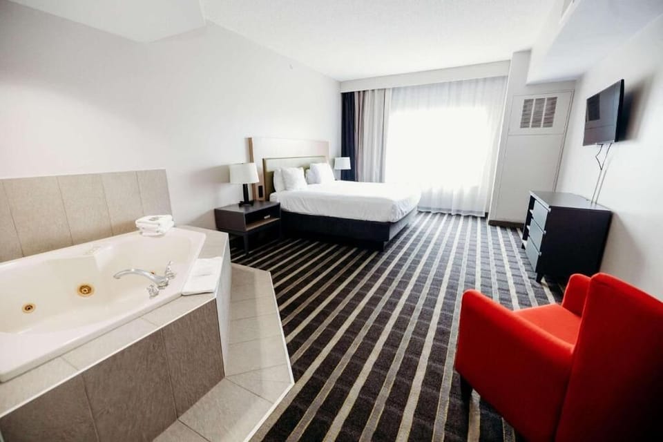 Deluxe Suite, 1 Bedroom, Non Smoking | Premium bedding, in-room safe, individually furnished, desk