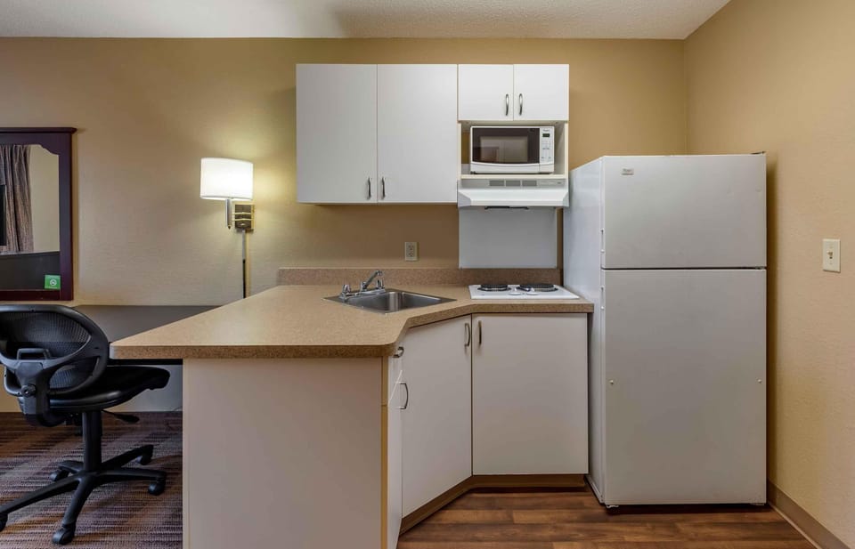 Studio, 1 King Bed, Non Smoking | Private kitchen | Full-size fridge, microwave, stovetop, coffee/tea maker