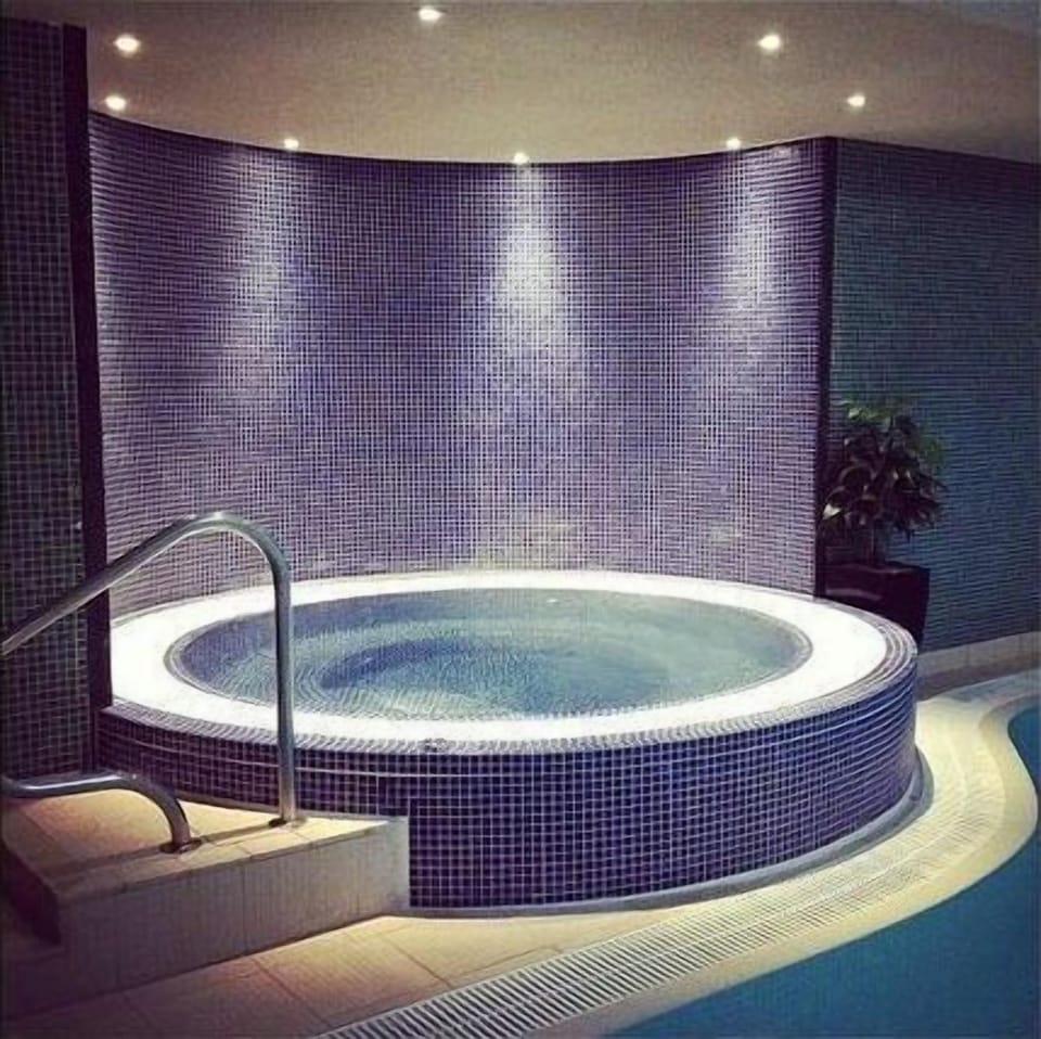 Enjoy a lovely soak in the hot tub after a day in the fells