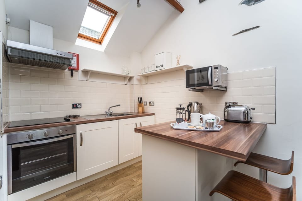 The kitchen is equipped with everything that you need to cook up delicious dinners on your self catering holiday in Keswick