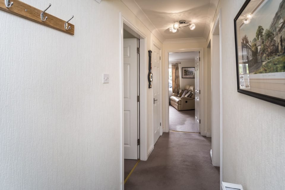 The front door leads into the entrance hall, with room for muddy boots and coats