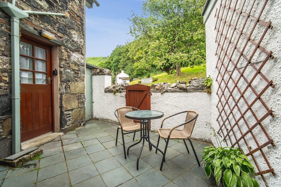At the rear of the property is a lovely patio and seating area with access to the kitchen