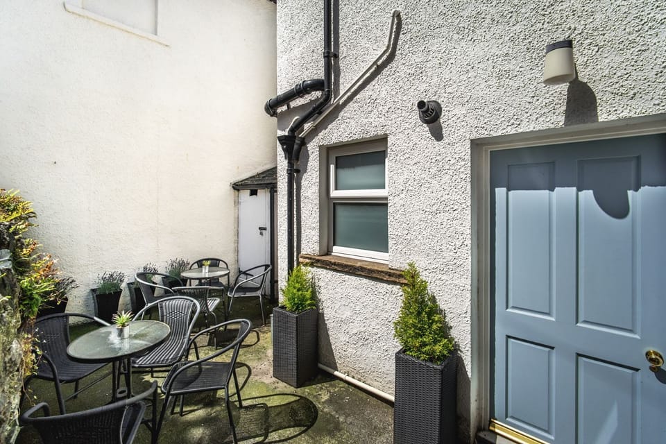 There is a small enclosed patio area to the rear of the property, accessed from the rear hallway