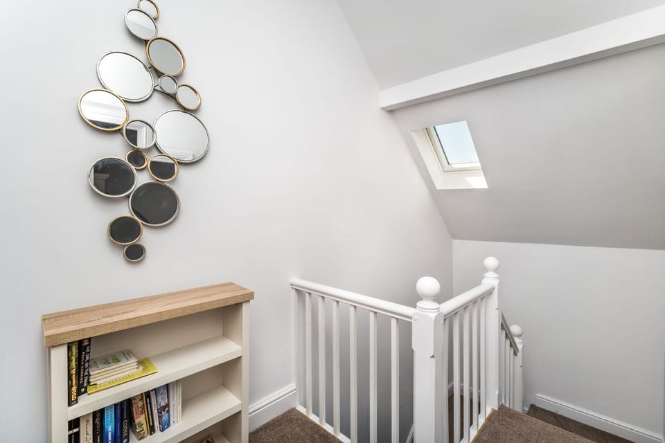 Access to the ground floor shower room is via the kitchen and hallway, where you will also find the washing machine