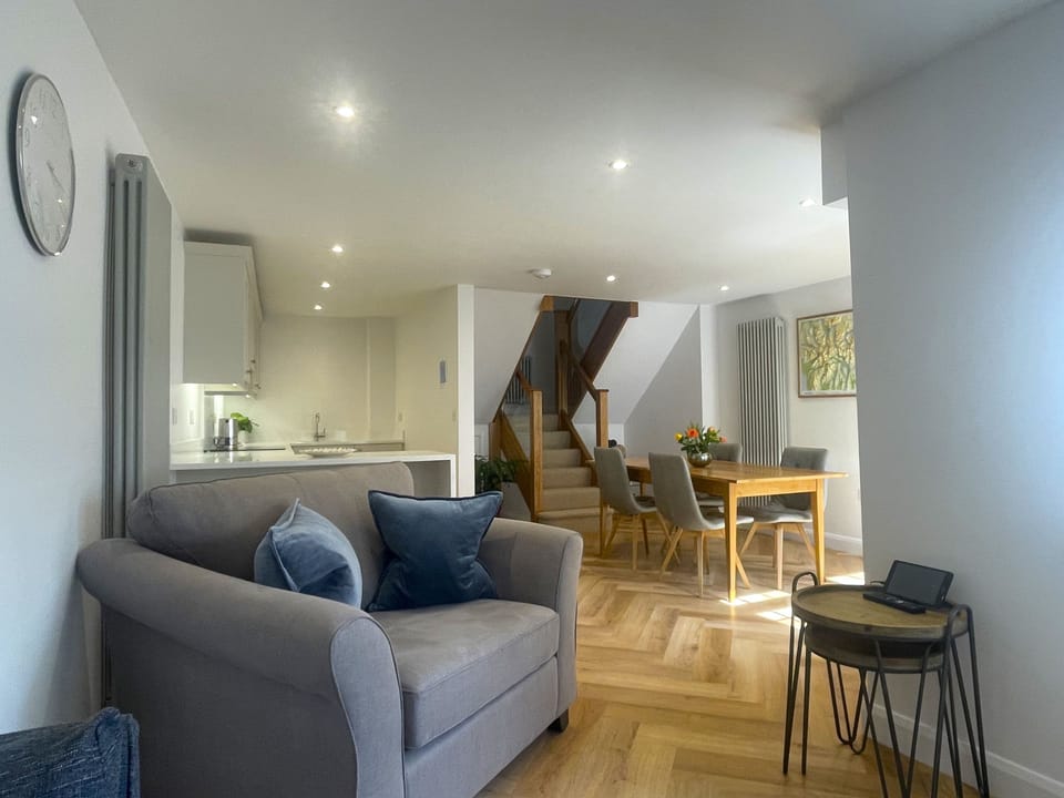 The L-shaped open plan living/dining and kitchen area is the perfect space to rest after a day in Keswick