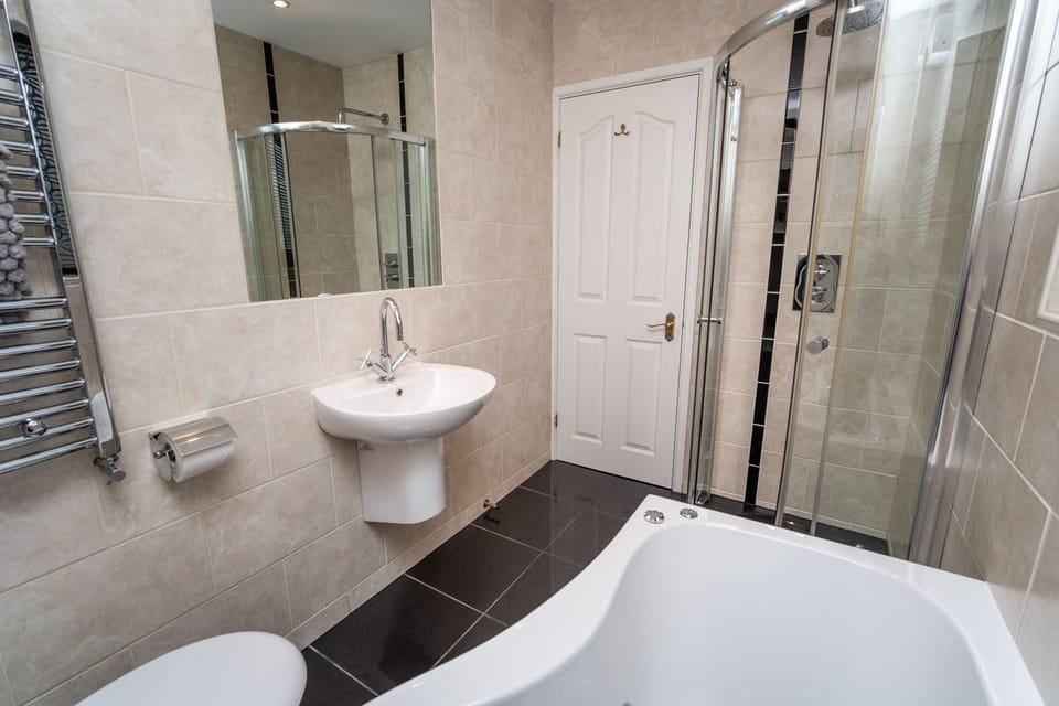 Enjoy a soak in the bath after activities in Portinscale and Keswick