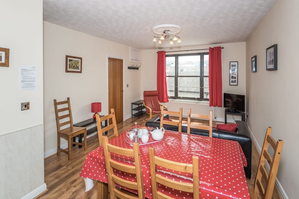 This room is the perfect space for everyone to gather and have dinner or play a game