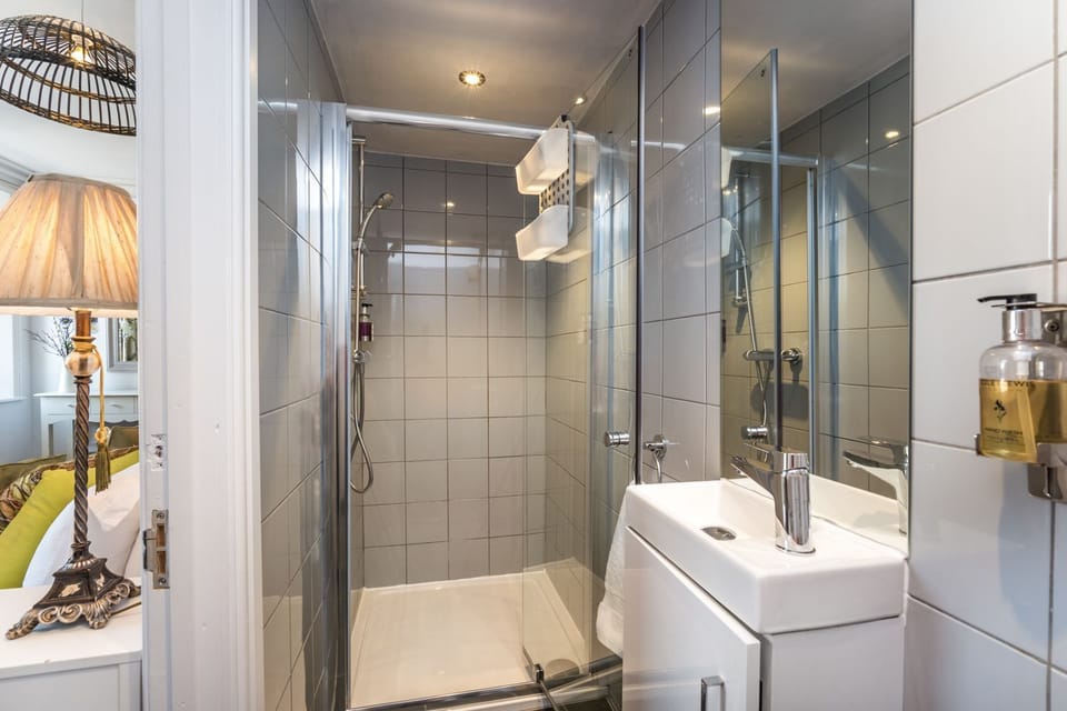 The master bedroom on the 1st floor has an ensuite shower room