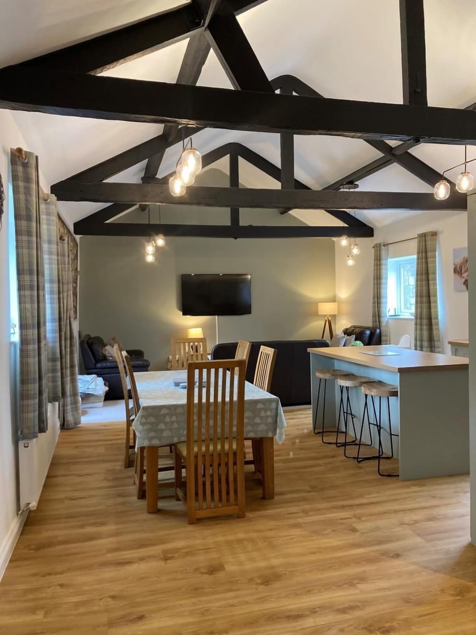 The open plan living and kitchen area is perfect for a large group