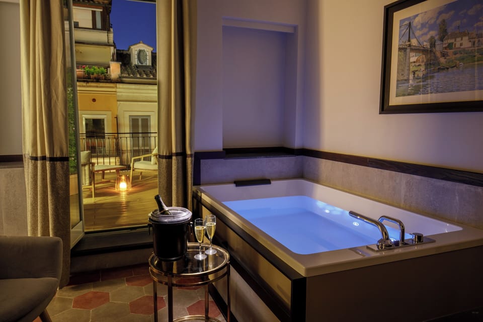 Suite, Terrace | Living area | 42-inch flat-screen TV with satellite channels, TV