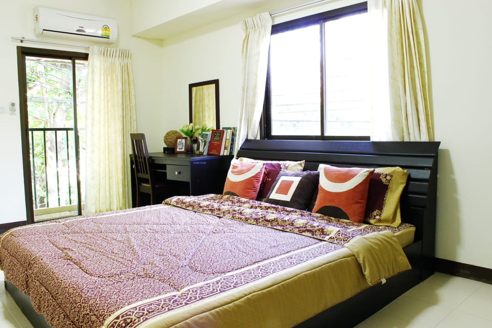 Desk, blackout drapes, iron/ironing board, rollaway beds