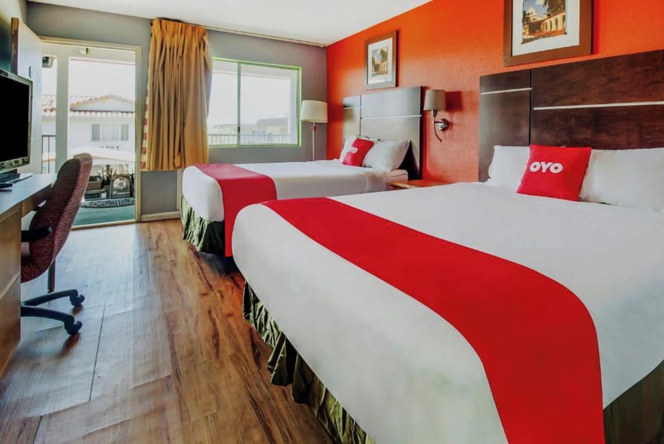 Room, 2 Queen Beds, Non Smoking | Desk, iron/ironing board (on request), WiFi (free), alarm clocks