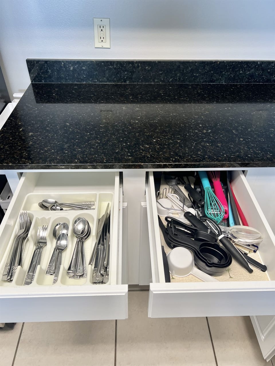 Fully stocked with pots, pans, dishes, silverware and glasses!
