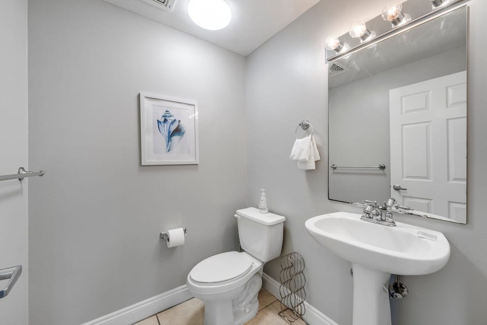 Half bath located off hall way