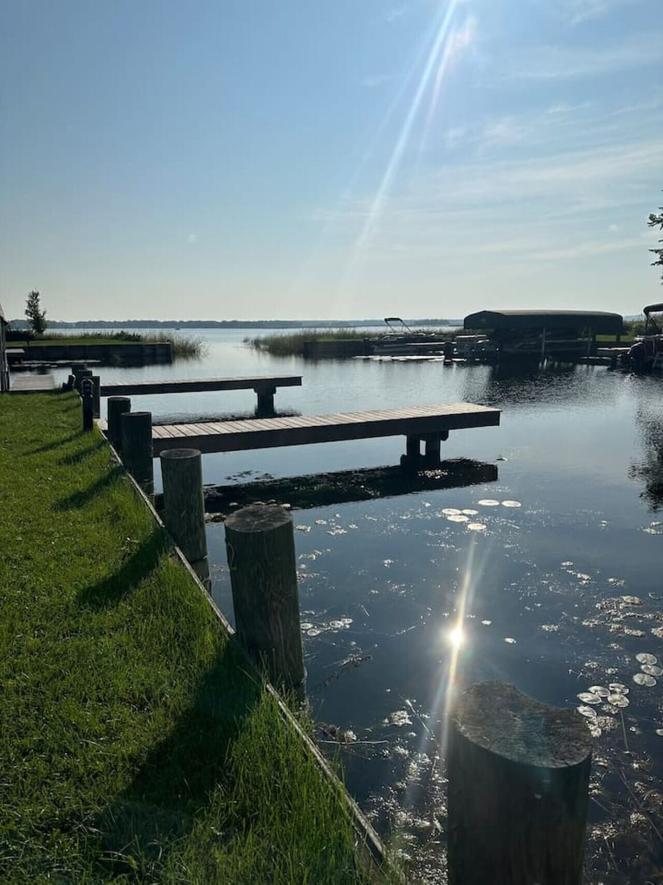 Revel in tranquil lake life with your private dock and stunning sunset views!