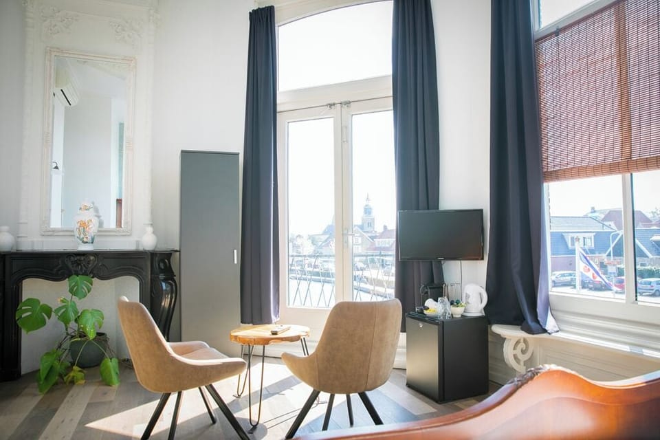 Junior Double Room, 1 King Bed, Balcony, Canal View | Premium bedding, desk, iron/ironing board, free WiFi