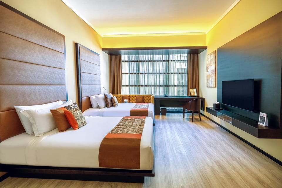 Premium bedding, down comforters, pillowtop beds, minibar