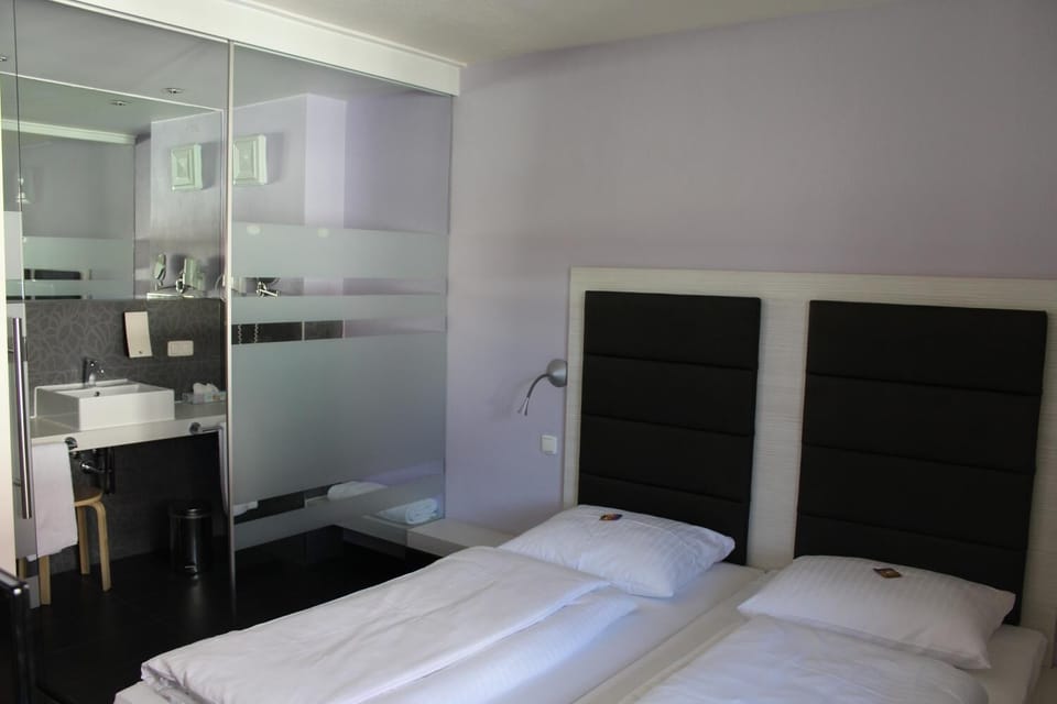 Hypo-allergenic bedding, in-room safe, desk, laptop workspace