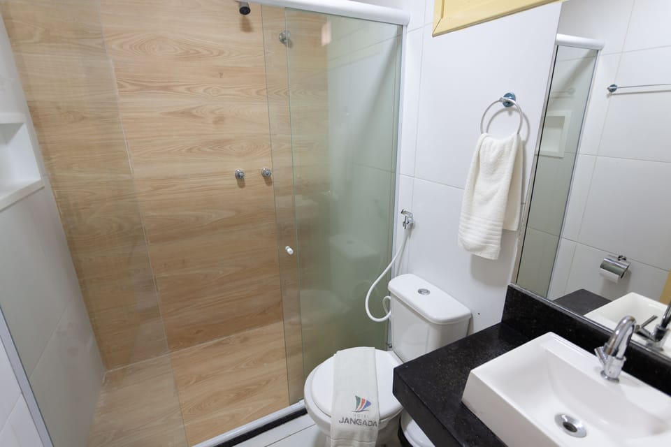 Shower, rainfall showerhead, towels, soap