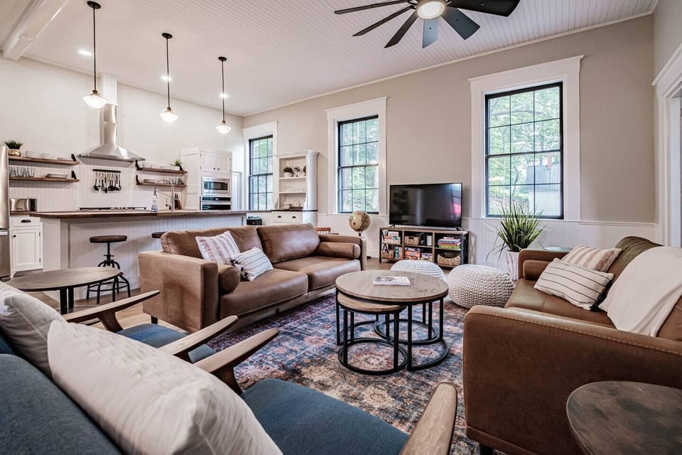 Enough seating in the living room for everyone to enjoy a movie on the 65" Roku TV with cable and streaming apps.