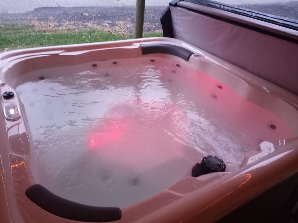 Enjoy a relaxing soak in the 6 person hot tub. 